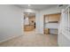 Staircase view from the kitchen, including a built-in desk at 10530 Eagle Nest St, Las Vegas, NV 89141