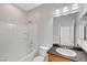 Bathroom with bathtub/shower combination, single sink vanity with granite countertops at 11356 Belmont Lake Dr # 103, Las Vegas, NV 89135