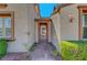 Inviting entrance showcasing a covered doorway with stone walkway and landscaped accents at 11356 Belmont Lake Dr # 103, Las Vegas, NV 89135