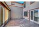 Spacious patio area showcasing concrete flooring and access to the interior of the home at 11356 Belmont Lake Dr # 103, Las Vegas, NV 89135
