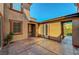 Outdoor patio with stamped concrete and sliding glass doors at 11356 Belmont Lake Dr # 103, Las Vegas, NV 89135