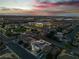 Aerial twilight view displays the property's position near parks and the city with outlined property lines at 1136 Casady Hollow Ave, Henderson, NV 89012