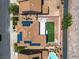Drone eye view of property showing backyard with modern design and solar at 1136 Casady Hollow Ave, Henderson, NV 89012