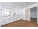 Modern bathroom with double vanity, marble countertops, and plenty of storage at 1136 Casady Hollow Ave, Henderson, NV 89012