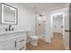 Contemporary bathroom with a sleek vanity, modern fixtures, and a walk-in shower at 1136 Casady Hollow Ave, Henderson, NV 89012