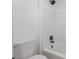 This bathroom features a toilet and tile surround tub at 1136 Casady Hollow Ave, Henderson, NV 89012
