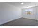 Bright carpeted bedroom with natural light, showcasing a pleasant view at 1136 Casady Hollow Ave, Henderson, NV 89012