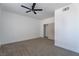 Bedroom featuring carpeted floor, ceiling fan and closet with sliding doors at 1136 Casady Hollow Ave, Henderson, NV 89012