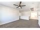 Bright bonus room with ceiling fan and neutral carpet offers versatile space for various activities at 1136 Casady Hollow Ave, Henderson, NV 89012