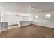 Large bonus room with modern ceiling fan, beautiful laminate flooring, and lots of light at 1136 Casady Hollow Ave, Henderson, NV 89012