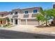 Well-maintained two-story home with three car garage, solar panels, and mature landscaping at 1136 Casady Hollow Ave, Henderson, NV 89012