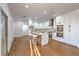 Modern kitchen featuring an island with seating and stainless steel appliances at 1136 Casady Hollow Ave, Henderson, NV 89012