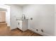 Functional laundry room with modern cabinets and sink, offering convenience and practicality at 1136 Casady Hollow Ave, Henderson, NV 89012
