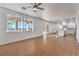 Open floor plan features living room with sliding glass doors and kitchen at 1136 Casady Hollow Ave, Henderson, NV 89012