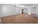 Open living area with a staircase and modern lighting fixtures illuminating the space at 1136 Casady Hollow Ave, Henderson, NV 89012