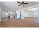 Spacious open floor plan with a modern kitchen, hardwood floors, and ample natural light at 1136 Casady Hollow Ave, Henderson, NV 89012