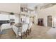 Open-concept kitchen featuring a large island and stainless steel appliances at 11550 Velicata Ct, Las Vegas, NV 89138