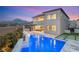 Stunning backyard pool with mountain views from this two-story modern home at 11943 Rockview Point St, Las Vegas, NV 89138