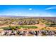 Aerial view of a neighborhood with a golf course and mountain views at 1199 Golf Club, Laughlin, NV 89029