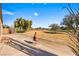 Backyard patio with desert landscaping, opening to a beautiful green golf course at 1199 Golf Club, Laughlin, NV 89029