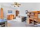 Comfortable bedroom featuring a sofa, desk, and ceiling fan at 1199 Golf Club, Laughlin, NV 89029