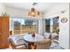 Cozy dining area with golf course views and sliding glass door at 1199 Golf Club, Laughlin, NV 89029