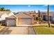 Charming single-story home featuring a three-car garage and well-maintained landscaping at 1199 Golf Club, Laughlin, NV 89029