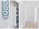 Bright hallway with closet and shelving for organized storage at 1199 Golf Club, Laughlin, NV 89029