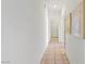 Clean hallway featuring neutral tile floors and white walls at 1199 Golf Club, Laughlin, NV 89029