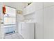 Convenient laundry room with ample cabinet storage at 1199 Golf Club, Laughlin, NV 89029