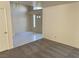 Open-concept living room featuring carpeted floors and a brightly lit entryway at 1249 Lucia Dr, Las Vegas, NV 89128