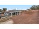 A house with a spacious covered patio and a large, low-maintenance backyard at 127 Mauve St, Henderson, NV 89012