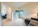Inviting sitting area with ample natural light and access to front door and additional living spaces at 127 Mauve St, Henderson, NV 89012