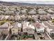 Real estate image showcasing the community, the street layout, and the proximity of homes to each other at 1324 Spice Ridge Ct, Henderson, NV 89012