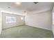 Expansive bedroom with carpet flooring and natural light from multiple windows at 1324 Spice Ridge Ct, Henderson, NV 89012