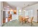 Cozy dining area adjacent to the kitchen with a view of the backyard at 1324 Spice Ridge Ct, Henderson, NV 89012