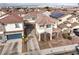 Two-story home showing architectural details, neutral color palette, and well-maintained landscaping at 1324 Spice Ridge Ct, Henderson, NV 89012
