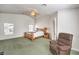 Main bedroom with vaulted ceiling, fan, and natural light from dual windows at 1324 Spice Ridge Ct, Henderson, NV 89012