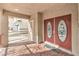 Close-up of the front porch with a decorative double door entry at 1324 Spice Ridge Ct, Henderson, NV 89012