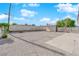 Backyard featuring a storage shed, tree and gravel landscaping at 1800 Atlantic St, Las Vegas, NV 89104