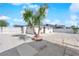 Backyard featuring a storage shed, tree and gravel landscaping at 1800 Atlantic St, Las Vegas, NV 89104