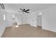 Bedroom featuring wood-look floors, a ceiling fan, and two closets at 1800 Atlantic St, Las Vegas, NV 89104