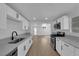 Modern kitchen with stainless steel appliances and white cabinets at 1800 Atlantic St, Las Vegas, NV 89104