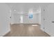 Open floor plan living area featuring light walls and wood-look floors at 1800 Atlantic St, Las Vegas, NV 89104