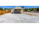 Backyard view showcasing a covered patio and a spacious outdoor area at 208 W Alma St, Overton, NV 89040