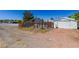 Expansive backyard with playset, storage shed, and plenty of room for outdoor activities at 208 W Alma St, Overton, NV 89040