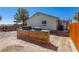 Spacious backyard featuring a built-in brick BBQ area with a grill, great for outdoor entertaining at 208 W Alma St, Overton, NV 89040