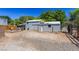Backyard featuring a gravel area and a metal shed, offering potential for customization at 208 W Alma St, Overton, NV 89040