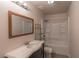 Bathroom with shower-tub combo, marble counter and tile flooring at 208 W Alma St, Overton, NV 89040