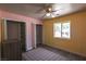 This charming bedroom has a closet, bright window, and an accent rug at 208 W Alma St, Overton, NV 89040